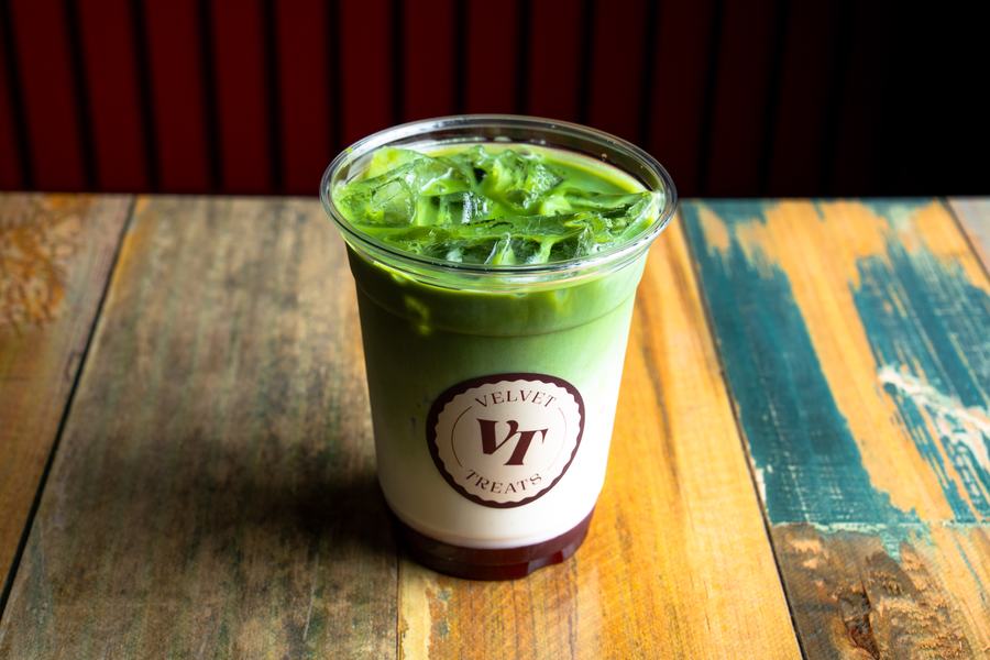 Iced signature matcha in a branded Velvet Treats cup