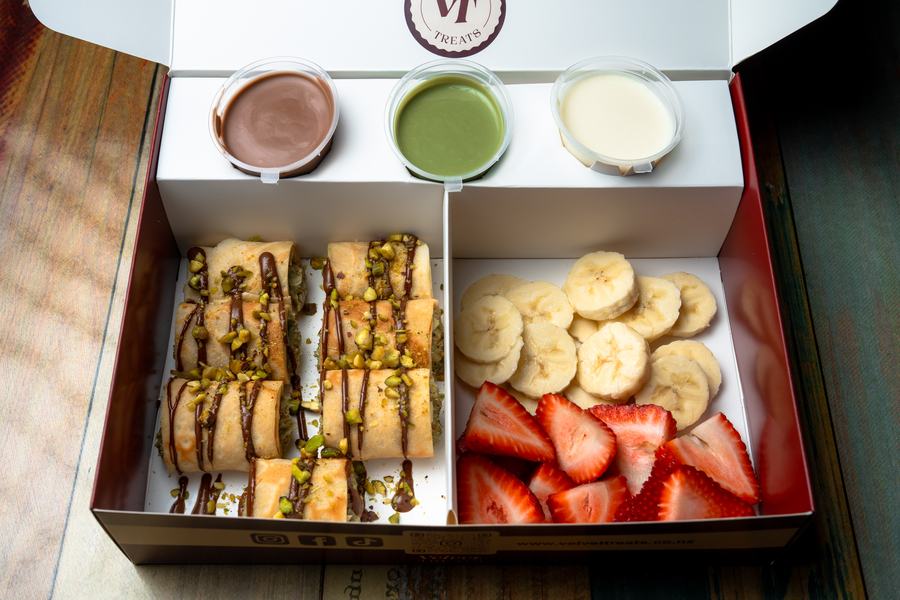 Sushi crepe luxury box with three dipping sauces and fresh fruit
