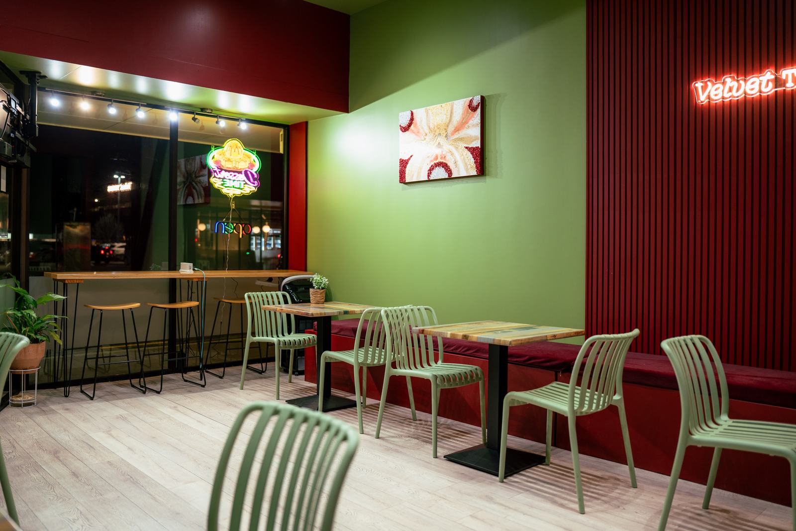 Guests' seating by the window at Velvet Treats
